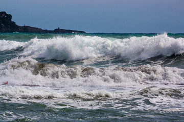 Stormy waves on the Ligurian sea in Italy.