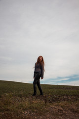 young beautiful woman in the field