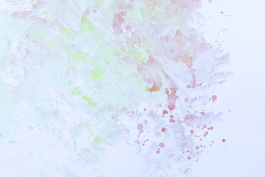 Watercolor splash background © Freepik