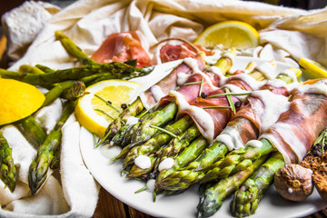 Delicious cooked asparagus with sauce, italian food concepta