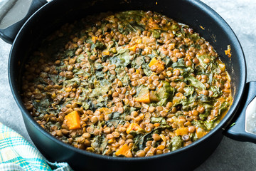Homemade Lentil Stew / Soup with Chard and Sweet Potatoes in Pot Pan