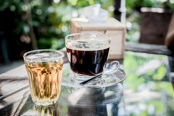 One cup of Americano coffee, ready to drink on the table