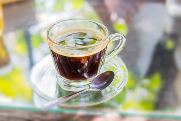 One cup of Americano coffee, ready to drink on the table