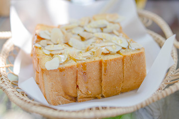 Toast topped with butter and chocolate.