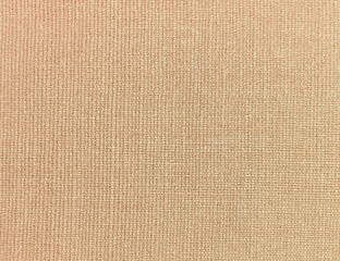 Fototapeta premium Textured background of beige natural textile 