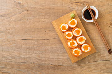 fresh salmon sushi roll with mayonnaise and shrimp egg