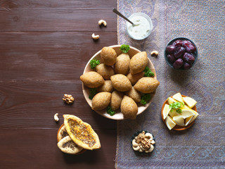Traditional Arabic kibbeh with lamb and pine nuts.