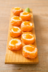 fresh salmon sushi roll with mayonnaise and shrimp egg