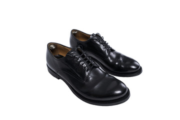 Classic men's black luxury leather shoes isolated on white background.