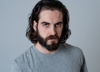 Mad and aggressive guy in facial expressions and negative human emotions