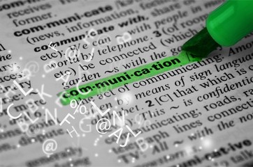 Communication  written in dictionary close up