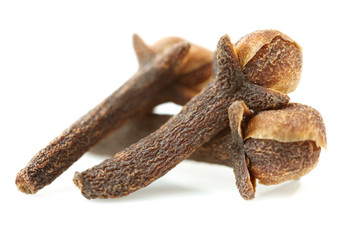 dry cloves on white background