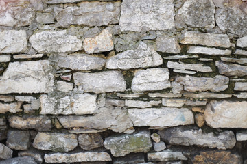 Texture of a stone wall. Old stone wall texture background.