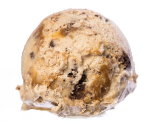 Single scoop of vanilla - caramel - brownie ice cream isolated on white background front view