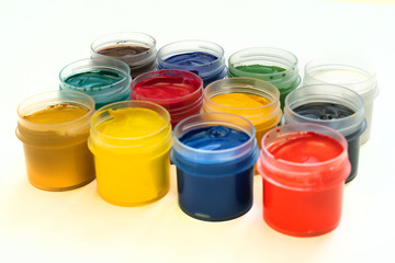 Creative background with art supplies on white background