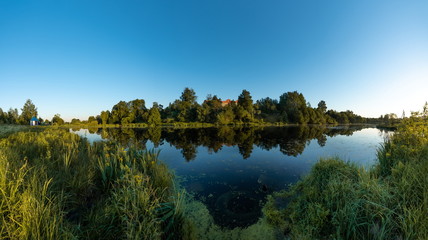 Beautiful evening lake at sunset