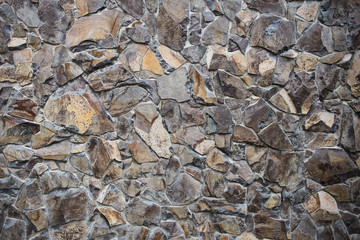 Texture of a stone wall. Old castle stone wall texture background. Part of a stone wall, for background or texture