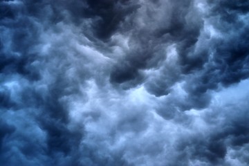 Almost unreal dark cloud formations right before a thunderstorm