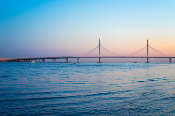 St. Petersburg, Russia : bridge across the Neva river in the part of the WHSD. This toll road...