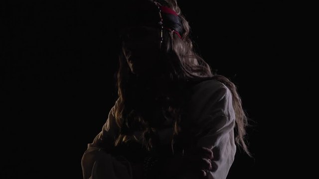 Dramatic lighting, female pirate is looking around in the dark, 4k