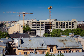 Fototapeta na wymiar Saint Petersburg, Russia, may 2019, Roofs Of St. Petersburg. View of the construction from the height.