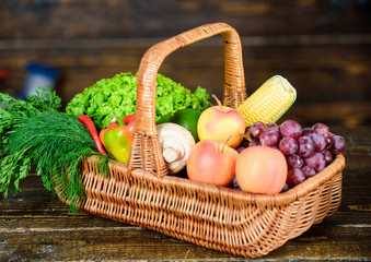 Basket with vegetables. harvest festival. basket with useful fruit and vegetables. rich autumn...