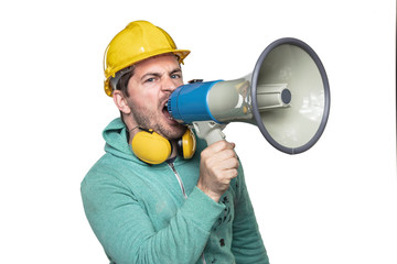 the construction worker holds a megaphone in his hands, the concept of issuing orders