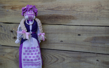 handmade purple motanka doll with embroidery