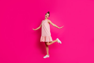 Full length body size view of her she nice-looking charming attractive lovely cheerful cheery funny girl flying wings isolated over bright vivid shine pink fuchsia background