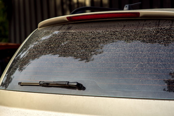 rear window wiper with dirty car.