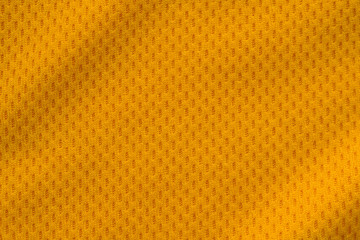 Orange color sports clothing fabric jersey football shirt texture top view