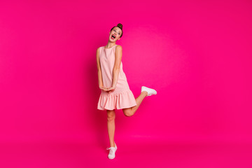 Full length body size view of her she nice-looking charming attractive lovable lovely gorgeous cheerful cheery slim fit thin girl having fun isolated on bright vivid shine pink fuchsia background