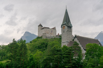 Fototapeta na wymiar view of the historic Gutenberg Castle and Sankt Nikolaus church in Liechtenstein