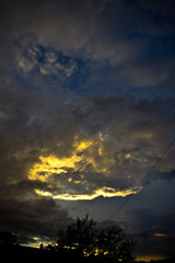 Fototapeta premium Sunset on the sky, colorful clouds and blue sky.