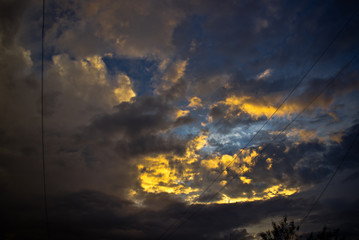 Sunset on the sky, colorful clouds and blue sky.