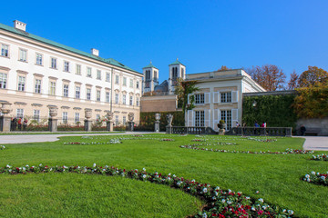 view of famous Mirabell Gardens with the old historic Fortress Hohensalzburg.