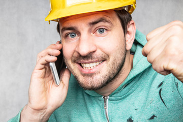 a building investor enjoys success during telephone negotiations
