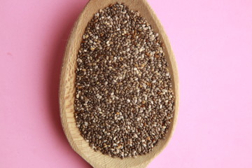 wooden spoon with black chia seeds