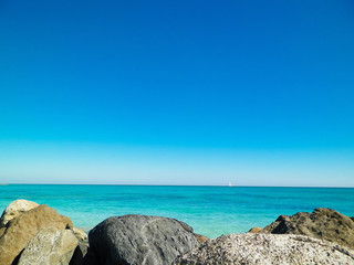 Stones on beach in Vada, Italy.