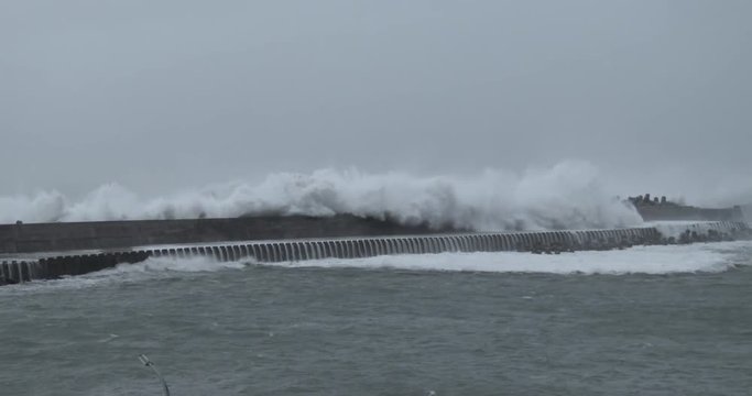 Large Waves Crash Over Sea Wall In Port - Megi