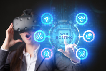 The concept of business, technology, the Internet and the network. A young entrepreneur working on a virtual screen of the future and sees the inscription: Web hosting