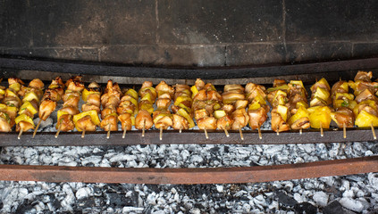 Skewers there meat with pineapple