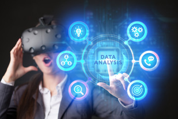 The concept of business, technology, the Internet and the network. A young entrepreneur working on a virtual screen of the future and sees the inscription: Data analysis