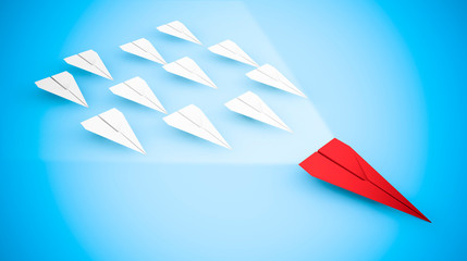 leadership concept with paper aircraft: the red plane faster
