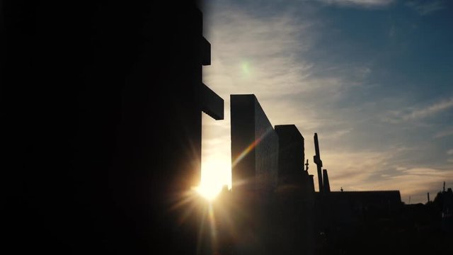 death life concept. cemetery crosses sunlight glints lifestyle from behind the graves at sunset cross silhouette