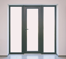 Big brown entrance doors with white spaces instead glass