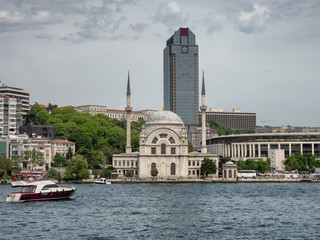 Fototapeta na wymiar Dolmabache Mosque seen from the waterside in Istanbul, Turkey