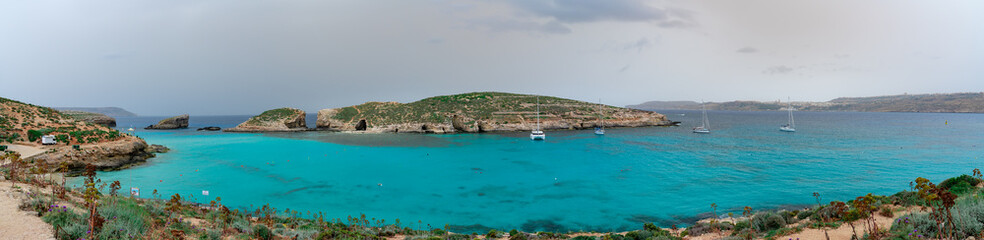 Obraz na płótnie Canvas Pure crystal turquoise water of Blue Lagoon in Comino Malta
