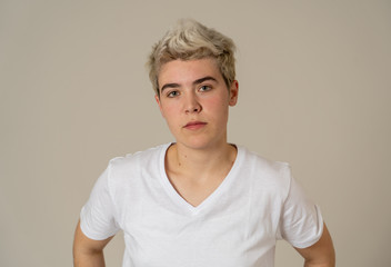 Portrait of a young teenager man with angry face looking furious.