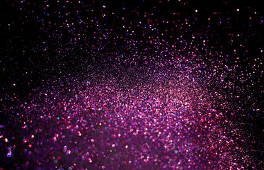 Purple sparkling shiny blurred background. Festive backdrop.